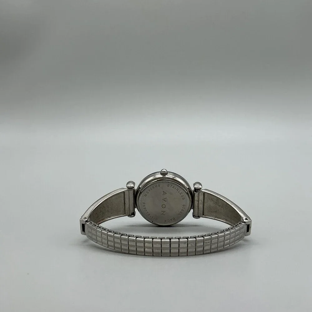 Avon Womens Watch 28mm Blue Abalone Bezel Inlay Stretch F69038-1/P New Battery